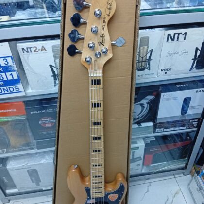 Fender 5 string Jazz bass guitarFender 5 string Jazz bass guitarThe Fender 5-String Jazz Bass is a versatile and iconic electric bass guitar that expands upon the legendary Jazz Bass design by adding a low B string for deep, extended frequency range. Featuring an offset-waist contoured body, a slim and fast neck profile, and dual single-coil pickups, it delivers the signature punchy, articulate tone that has defined countless genres from jazz and funk to rock and pop. This instrument combines classic Fender styling and modern playability, making it a reliable workhorse for both studio recording and live stage performances.Key SpecificationsStrings: 5 strings (Standard tuning: B-E-A-D-G).Body Shape: Iconic Jazz Bass offset-waist design.Neck Profile: Modern "C" or "Slim C" shape for fast, comfortable playability.Pickups: Dual single-coil Jazz Bass pickups (bridge and middle positions).Scale Length: Standard 34 inches (864 mm).Controls: Two volume controls (one for each pickup) and a master tone control (passive variants) or multi-band active EQ (active variants).Hardware: Vintage-style or HiMass bridge with standard open-gear tuning machines.